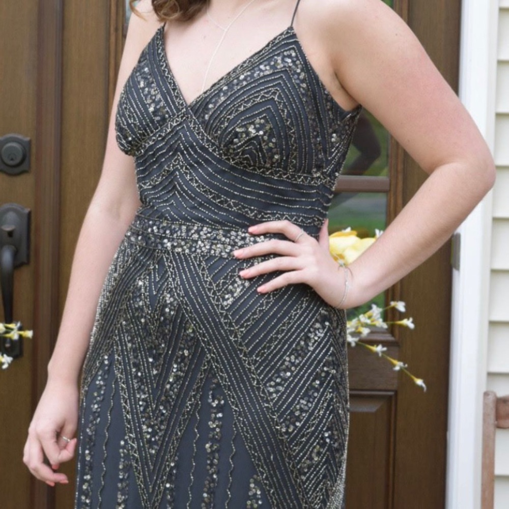 Black with metallic beads Size 12 prom gown